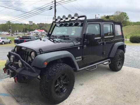 2014 Jeep Wrangler Unlimited for sale at Clayton Auto Sales in Winston-Salem NC