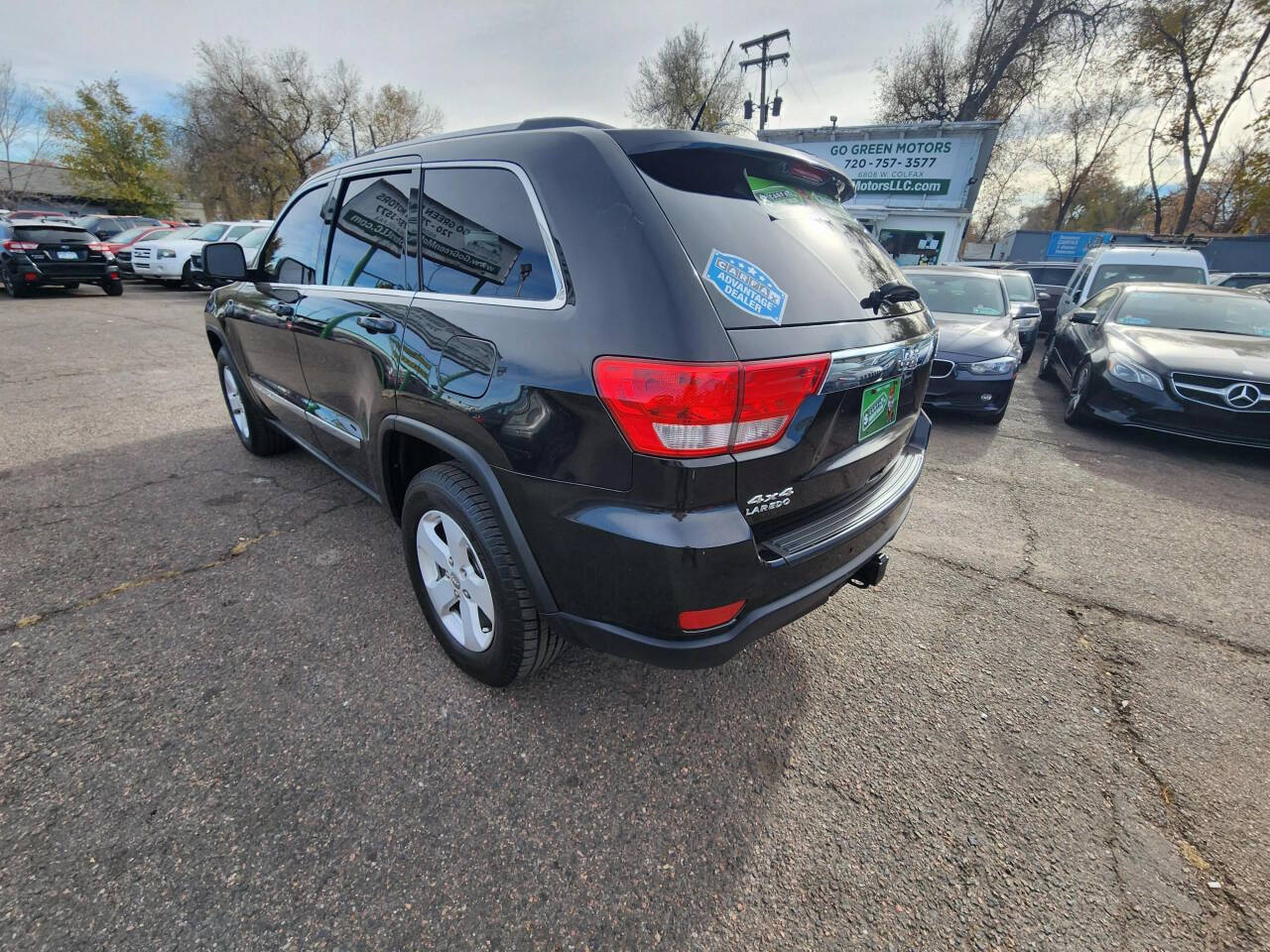 2011 Jeep Grand Cherokee for sale at GO GREEN MOTORS in Lakewood, CO