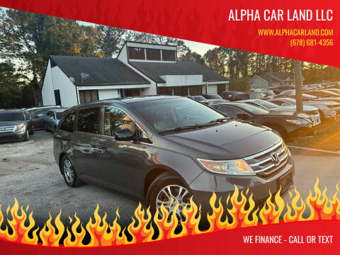 2012 Honda Odyssey for sale at Alpha Car Land LLC in Snellville GA