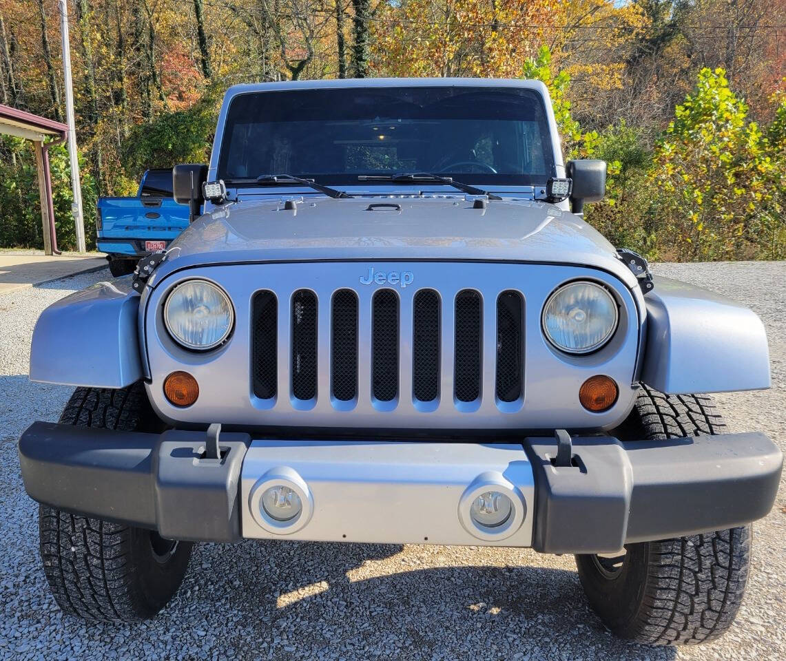 2013 Jeep Wrangler Unlimited for sale at COOPER AUTO SALES in ONEIDA, TN