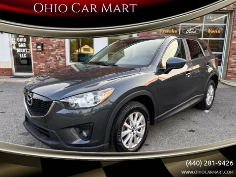 2013 Mazda CX-5 for sale at Ohio Car Mart in Elyria OH