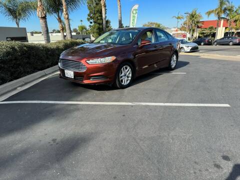 2016 Ford Fusion for sale at The Truck & SUV Center in San Diego CA