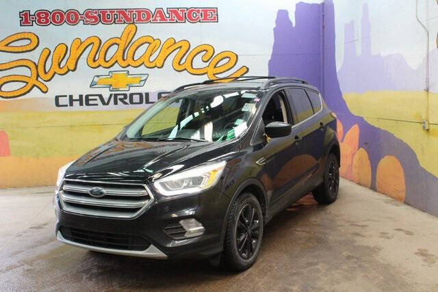 Used 2017 Ford Escape SE with VIN 1FMCU9G95HUD62500 for sale in Grand Ledge, MI