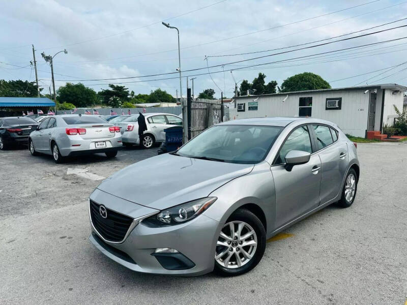 2014 Mazda MAZDA3 for sale at MAGIC CITY AUTO in Miami FL