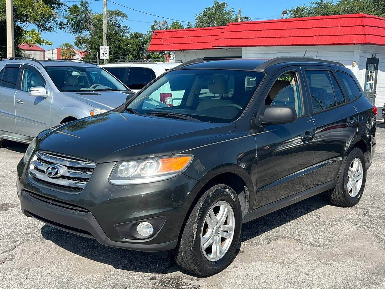 2012 Hyundai SANTA FE for sale at JOHNS AUTO SALES LLC in Apopka, FL