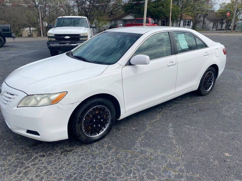 2009 Toyota Camry for sale at Howard Johnson's  Auto Mart, Inc. in Hot Springs AR