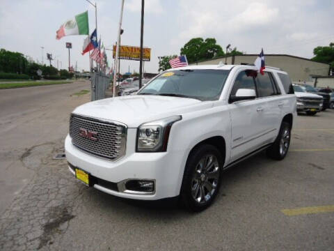 2015 GMC Yukon for sale at Campos Trucks & SUVs, Inc. in Houston TX