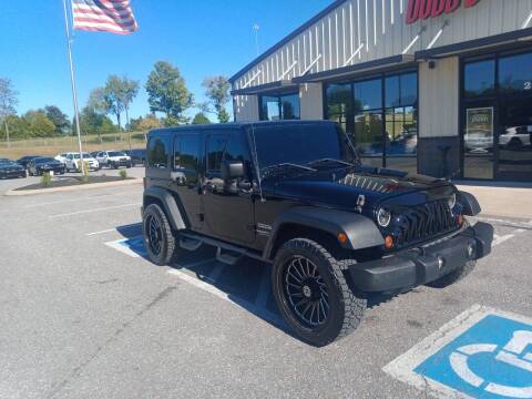 2012 Jeep Wrangler Unlimited for sale at DOUG'S AUTO SALES INC in Pleasant View TN