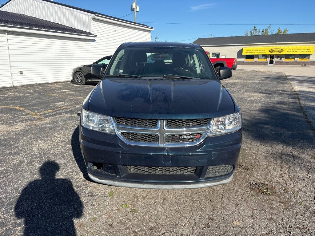 2014 Dodge Journey for sale at DECKER AUTO SALES in Bay City, MI