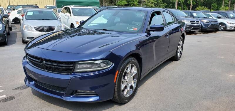 2015 Dodge Charger for sale at GEORGIA AUTO DEALER LLC in Buford GA