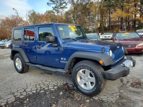 2009 Jeep Wrangler Unlimited for sale at Import Plus Auto Sales in Norcross GA