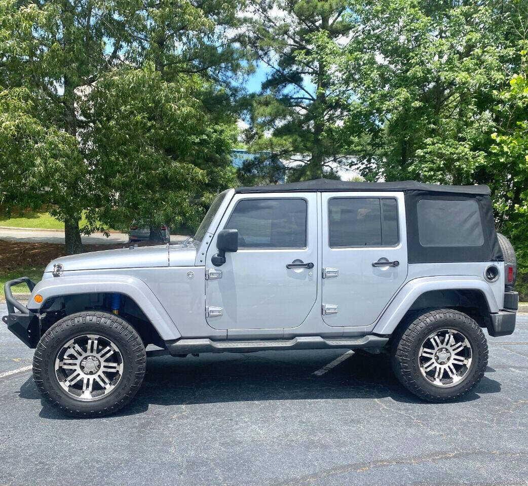 2013 Jeep Wrangler Unlimited for sale at International Car Service, Inc in DULUTH, GA