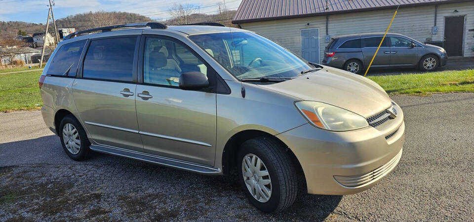 2004 Toyota Sienna for sale at Art's Used Cars in Winfield, WV