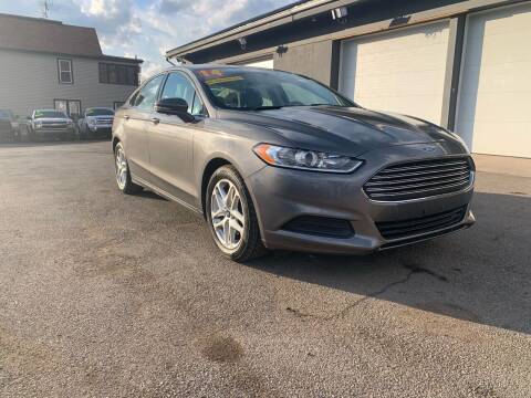 2014 Ford Fusion for sale at Valley Auto Finance in Warren OH