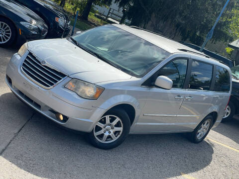 2010 Chrysler Town and Country for sale at Exclusive Auto Group in Cleveland OH
