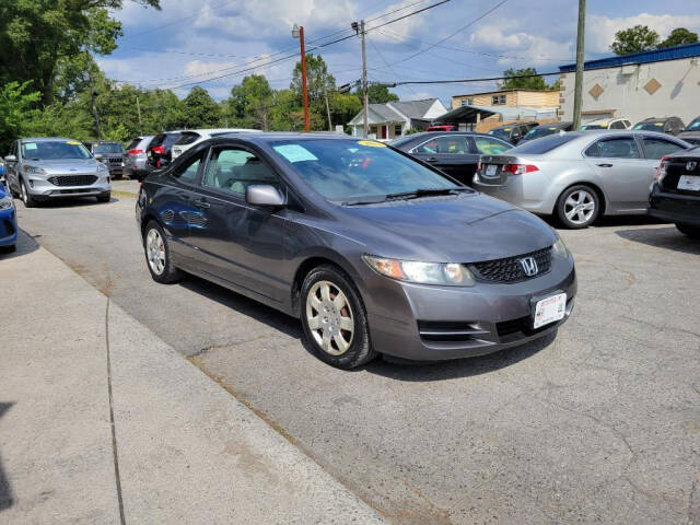 2011 Honda Civic for sale at DAGO'S AUTO SALES LLC in Dalton, GA