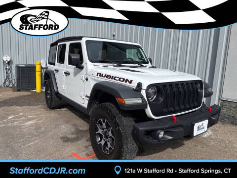 2021 Jeep Wrangler Unlimited for sale at International Motor Group - Stafford CDJR in Stafford Springs, CT
