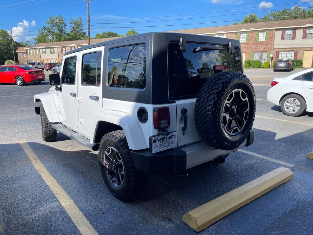 2012 Jeep Wrangler Unlimited for sale at INTEGRITY AUTO in Dothan, AL