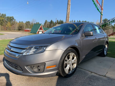 2012 Ford Fusion for sale at CARS R US in Caro MI