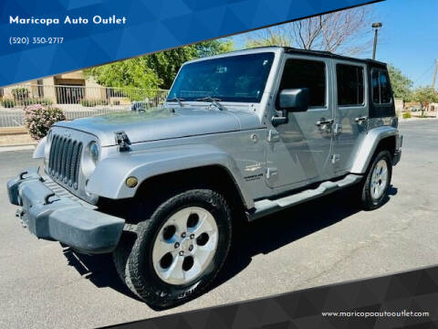 2014 Jeep Wrangler Unlimited for sale at Maricopa Auto Outlet in Maricopa AZ