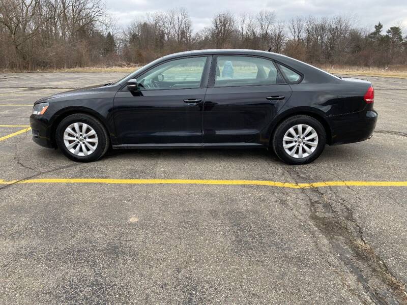 2013 Volkswagen Passat for sale at Caruzin Motors in Flint MI