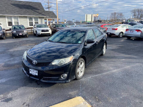 2014 Toyota Camry for sale at International Motor Co. in Saint Charles MO