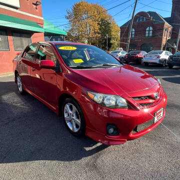 2012 Toyota Corolla for sale at A & J AUTO GROUP in New Bedford MA