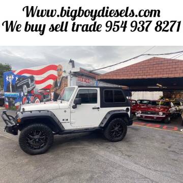 2009 Jeep Wrangler for sale at BIG BOY DIESELS in Fort Lauderdale FL