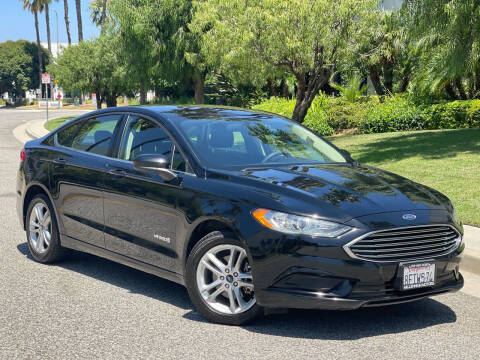 2018 Ford Fusion Hybrid for sale at MILLENNIUM MOTORS in Van Nuys CA