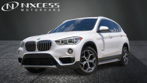 2017 BMW X1 for sale at NXCESS MOTORCARS in Houston TX