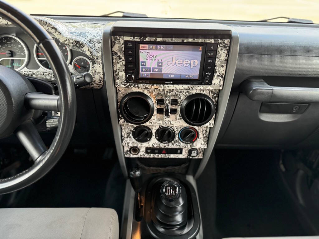 2010 Jeep Wrangler Unlimited for sale at Kanda Motors in Dallas, TX