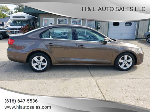 2012 Volkswagen Jetta for sale at H & L AUTO SALES LLC in Wyoming MI