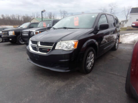 2014 Dodge Grand Caravan for sale at Pool Auto Sales Inc in Spencerport NY
