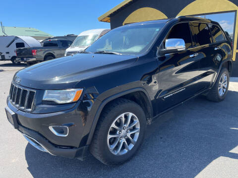 2014 Jeep Grand Cherokee for sale at BELOW BOOK AUTO SALES in Idaho Falls ID