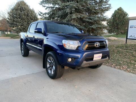 2014 Toyota Tacoma for sale at Blue Star Auto Group in Frederick CO