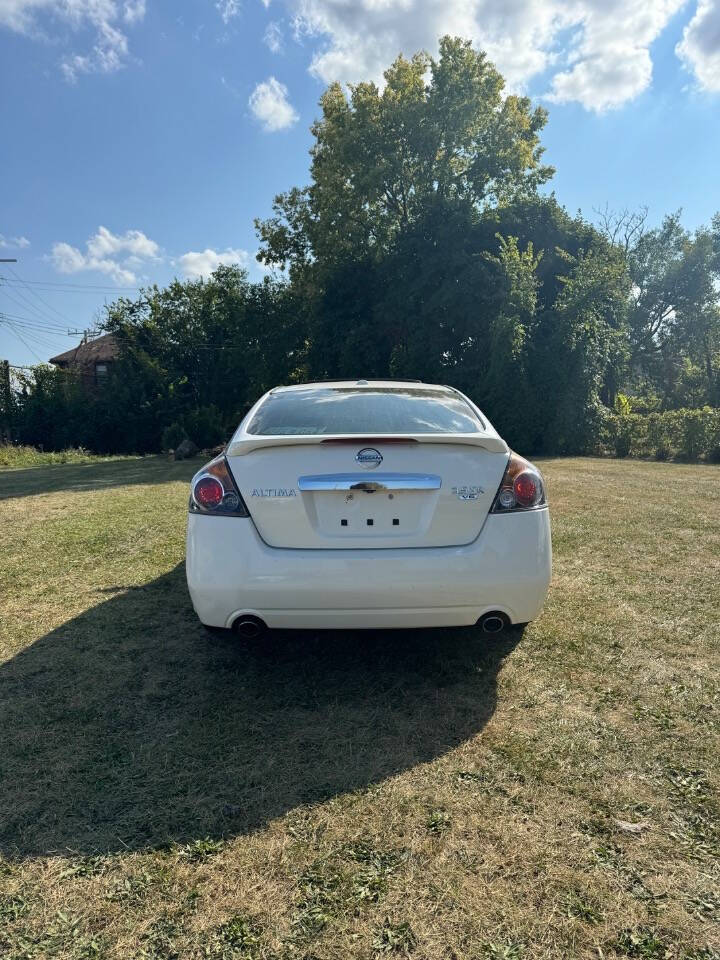 2012 Nissan Altima for sale at H & H AUTO GROUP in Detroit, MI