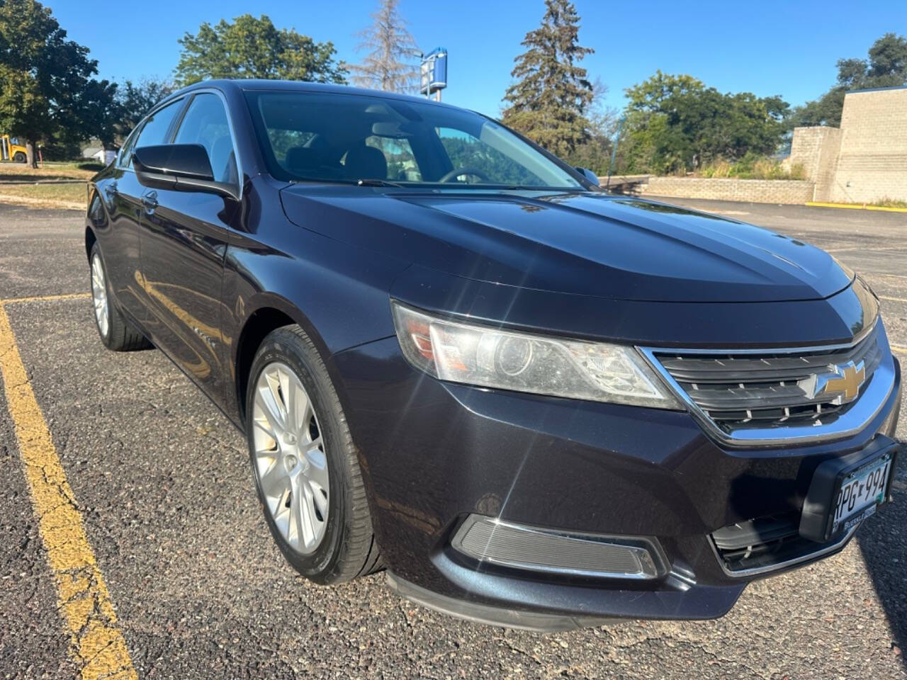 2014 Chevrolet Impala for sale at JUST AUTOS in MINNEAPOLIS, MN