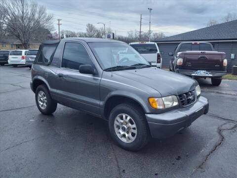 2001 Kia Sportage for sale at HOWERTON'S AUTO SALES in Stillwater OK