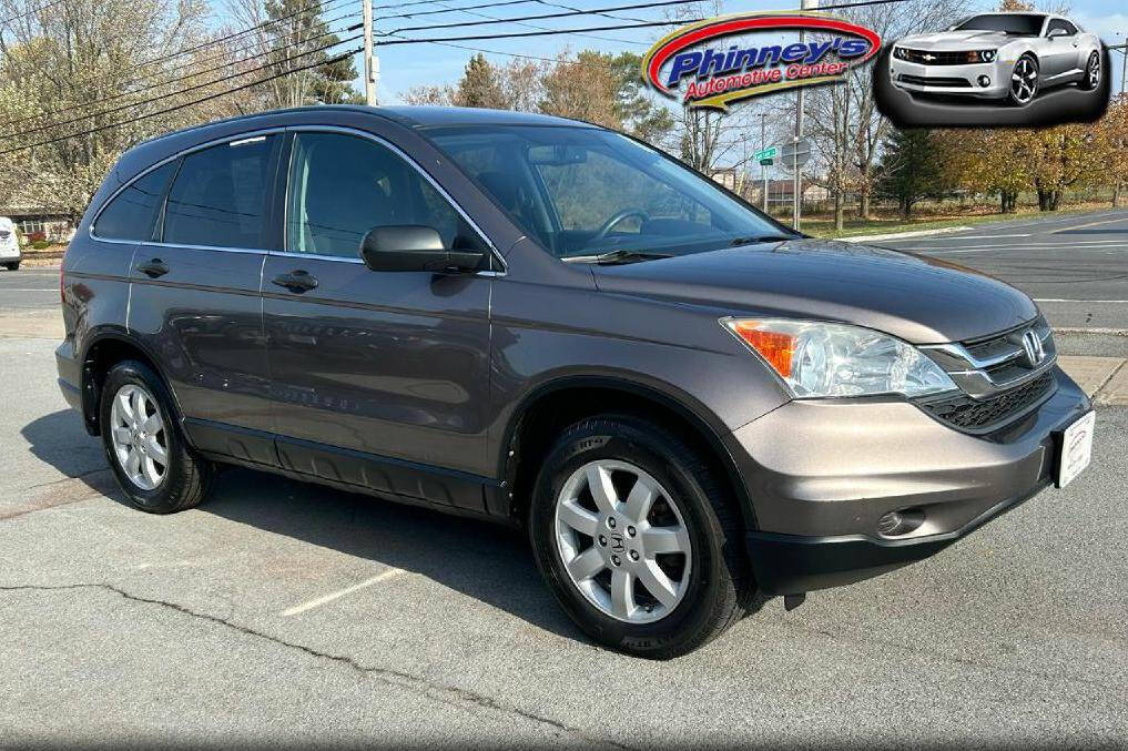 2011 Honda CR-V for sale at Phinney's Automotive Center in Clayton, NY