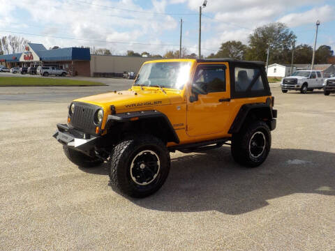 2012 Jeep Wrangler for sale at Young's Motor Company Inc. in Benson NC