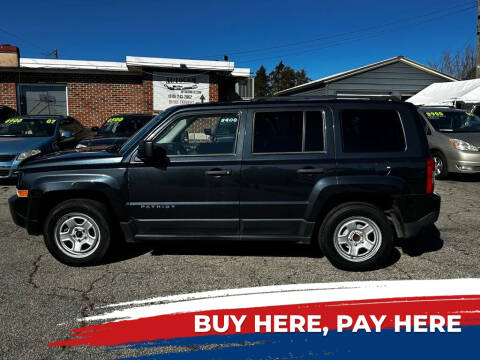 2015 Jeep Patriot for sale at Autocom, LLC in Clayton NC