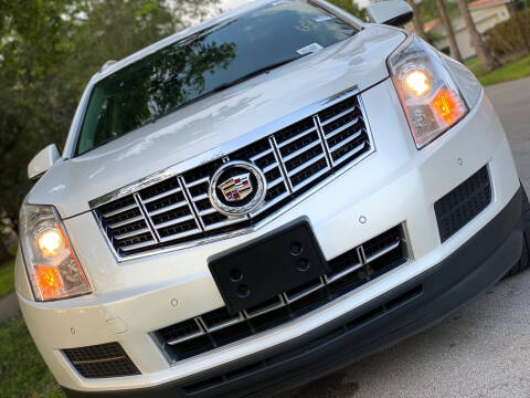 2014 Cadillac SRX for sale at HIGH PERFORMANCE MOTORS in Hollywood FL