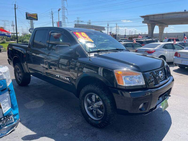 2014 Nissan Titan for sale at Texas 1 Auto Finance in Kemah TX