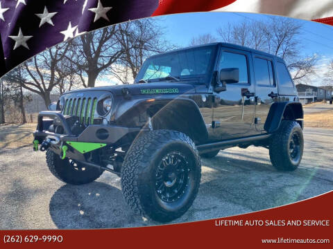 2014 Jeep Wrangler Unlimited for sale at Lifetime Auto Sales and Service in West Bend WI