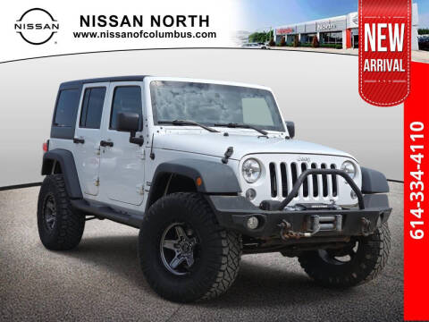 2016 Jeep Wrangler Unlimited for sale at Auto Center of Columbus in Columbus OH