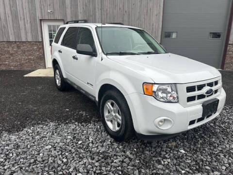 2010 Ford Escape Hybrid for sale at SMITH FAMILY CAR STORE INC in Roaring Spring PA