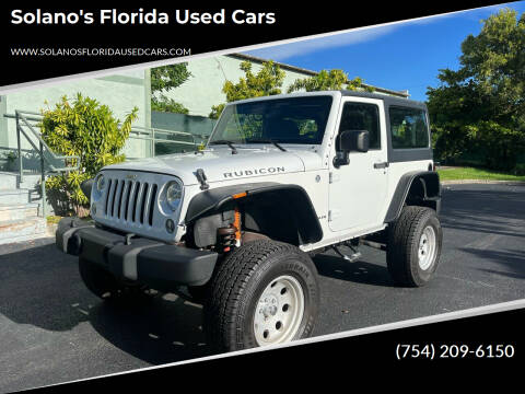 2014 Jeep Wrangler for sale at SOLANOS & SANCHEZ AUTO SALES C in Hollywood FL