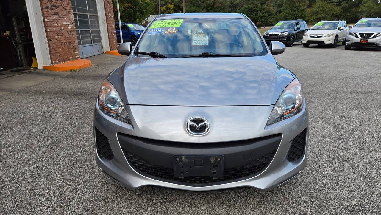 2012 Mazda Mazda3 for sale at North Ridge Auto Center LLC in Madison, OH