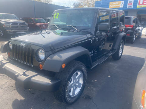 2012 Jeep Wrangler Unlimited for sale at Lee's Auto Sales in Garden City MI