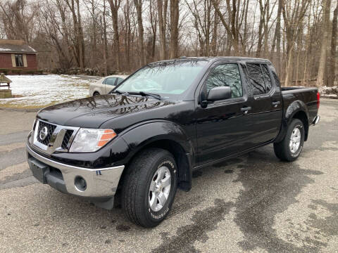 2011 Nissan Frontier for sale at Lou Rivers Used Cars in Palmer MA
